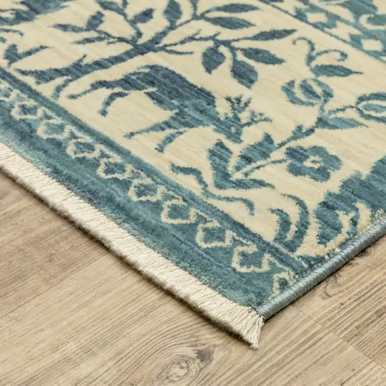 Ivory And Blue Oriental Area Rug With Fringe Photo 9