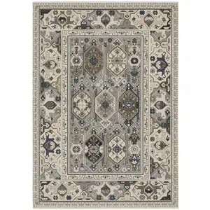 Photo of Ivory And Blue Oriental Area Rug With Fringe