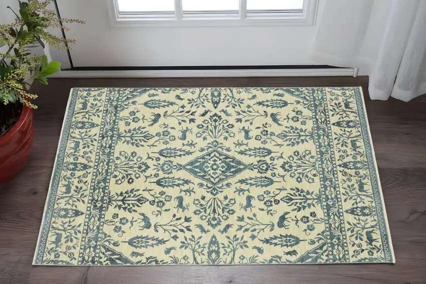 Ivory And Blue Oriental Area Rug With Fringe Photo 1