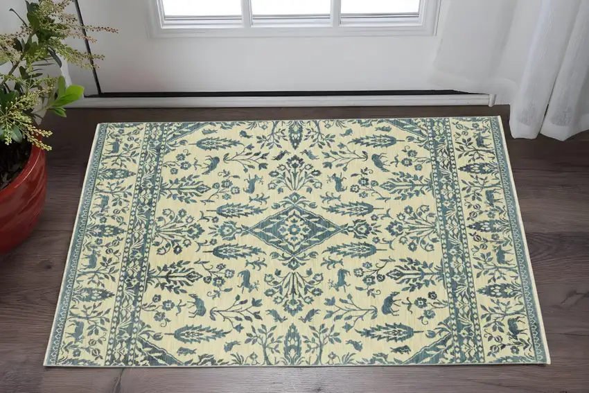 Ivory And Blue Oriental Area Rug With Fringe Photo 1