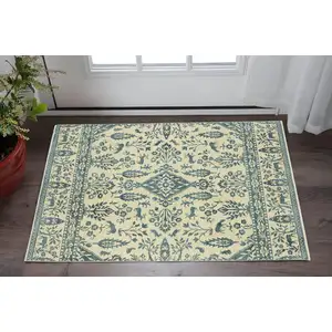 Photo of Ivory And Blue Oriental Area Rug With Fringe