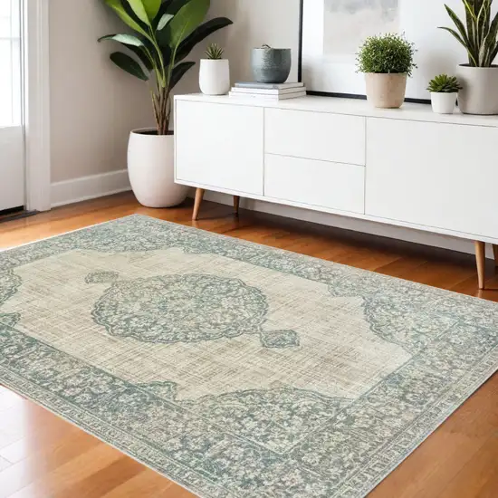 Ivory And Blue Oriental Distressed Area Rug Photo 1