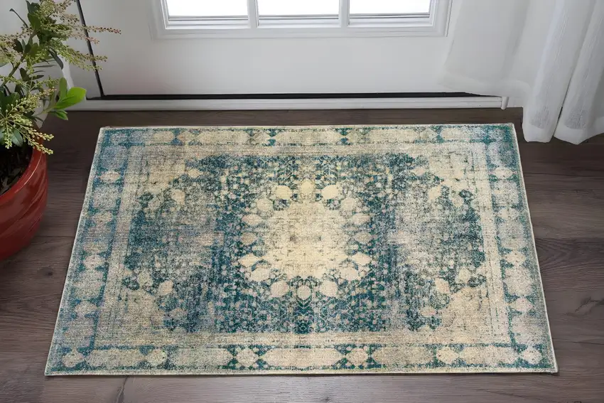 Ivory And Blue Oriental Distressed Area Rug Photo 1
