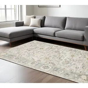 Photo of Ivory And Blue Oriental Hand Tufted Area Rug