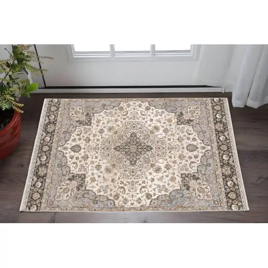 Ivory And Blue Oriental Power Loom Stain Resistant Area Rug With Fringe Photo 1