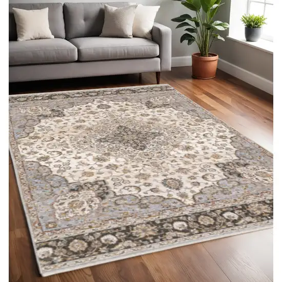 Ivory And Blue Oriental Power Loom Stain Resistant Area Rug With Fringe Photo 1