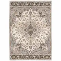 Photo of Ivory And Blue Oriental Power Loom Stain Resistant Area Rug With Fringe