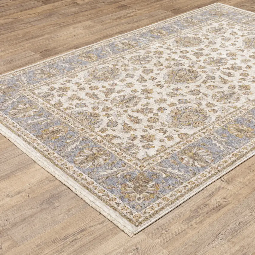 Ivory And Blue Oriental Power Loom Stain Resistant Area Rug With Fringe Photo 6