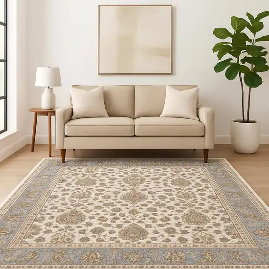 Ivory And Blue Oriental Power Loom Stain Resistant Area Rug With Fringe Photo 1