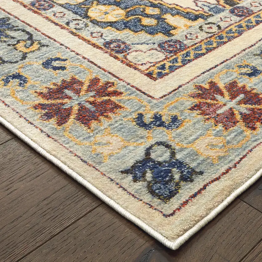 Ivory And Blue Oriental Power Loom Stain Resistant Area Rug Photo 3