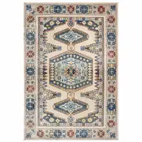 Photo of Ivory And Blue Oriental Power Loom Stain Resistant Area Rug