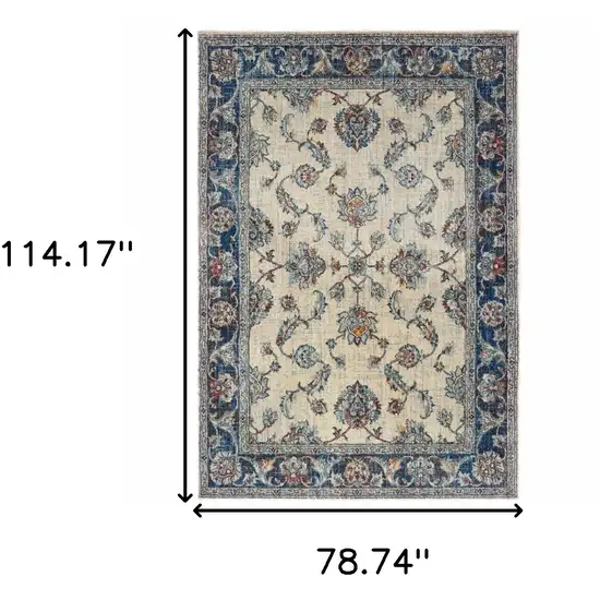 Ivory And Blue Oriental Power Loom Stain Resistant Area Rug Photo 5