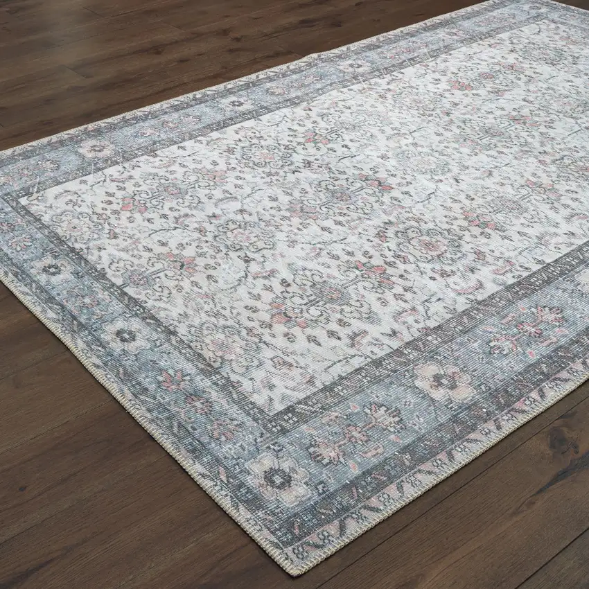 Ivory And Blue Oriental Power Loom Stain Resistant Area Rug Photo 4