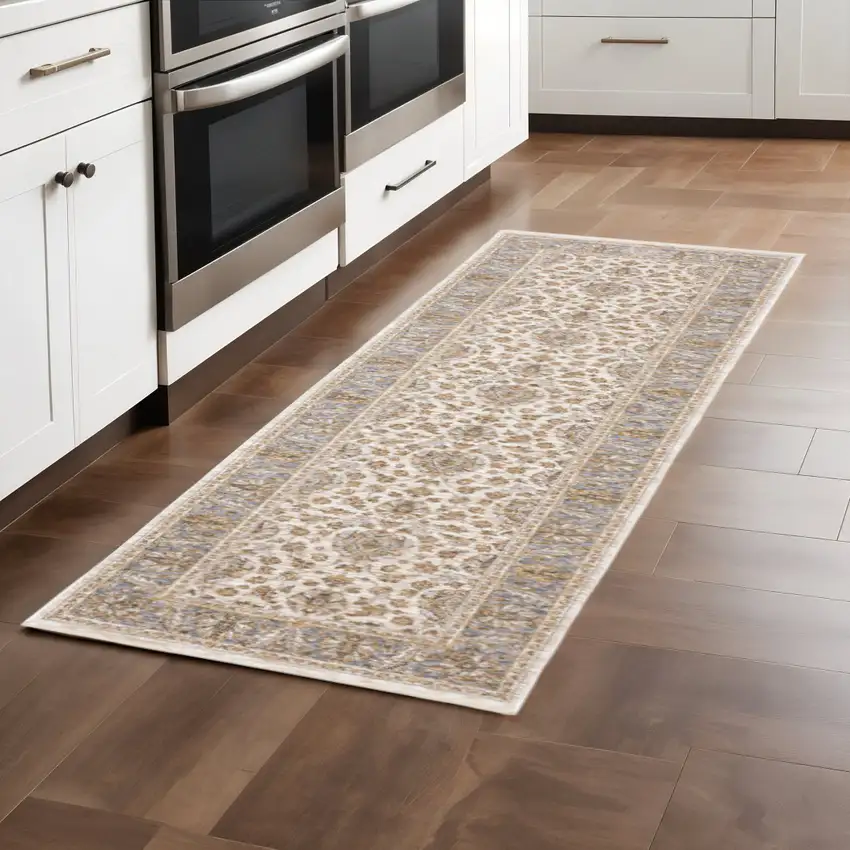 2' X 8' Ivory And Blue Oriental Power Loom Stain Resistant Runner Rug With Fringe Photo 1