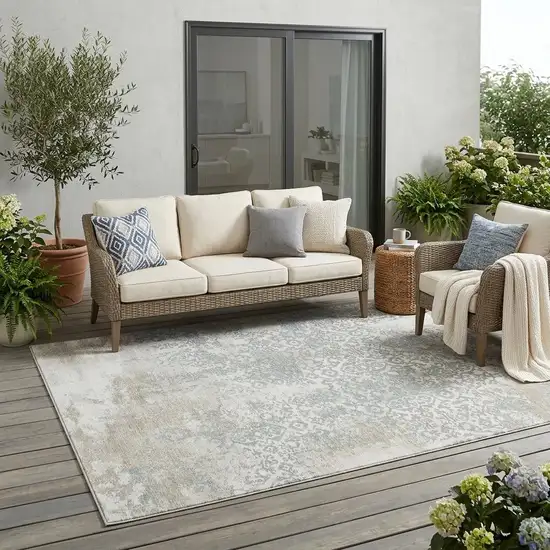 Ivory And Blue Oriental Washable Indoor Outdoor Area Rug Photo 1