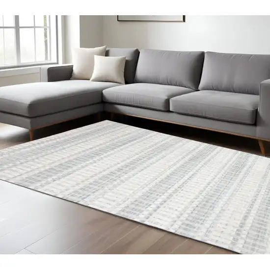 Ivory And Blue Striped Hand Woven Area Rug Photo 1