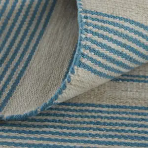 Photo of Ivory And Blue Striped Handmade Indoor Outdoor Area Rug