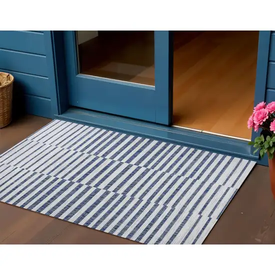 Ivory And Blue Striped Indoor Outdoor Area Rug Photo 1