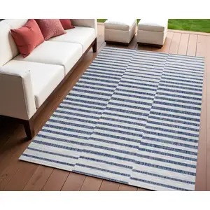 Photo of Ivory And Blue Striped Indoor Outdoor Area Rug