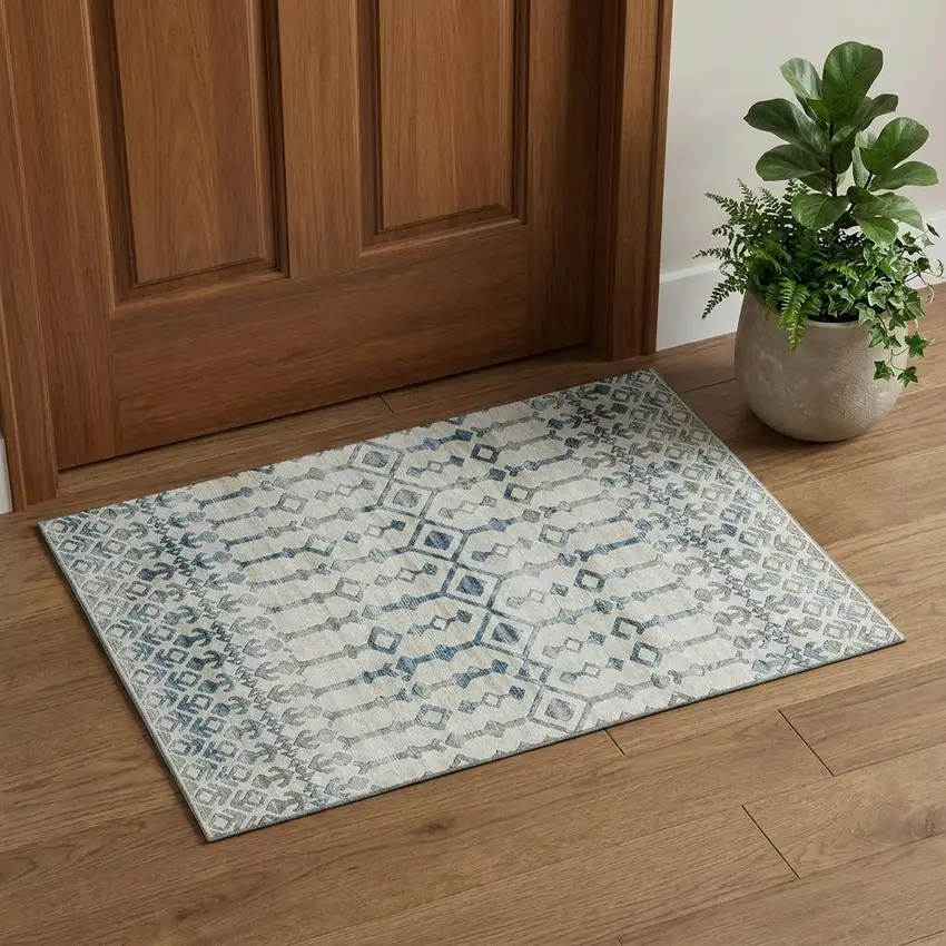 Ivory And Blue Tribal Washable Area Rug With UV Protection Photo 1