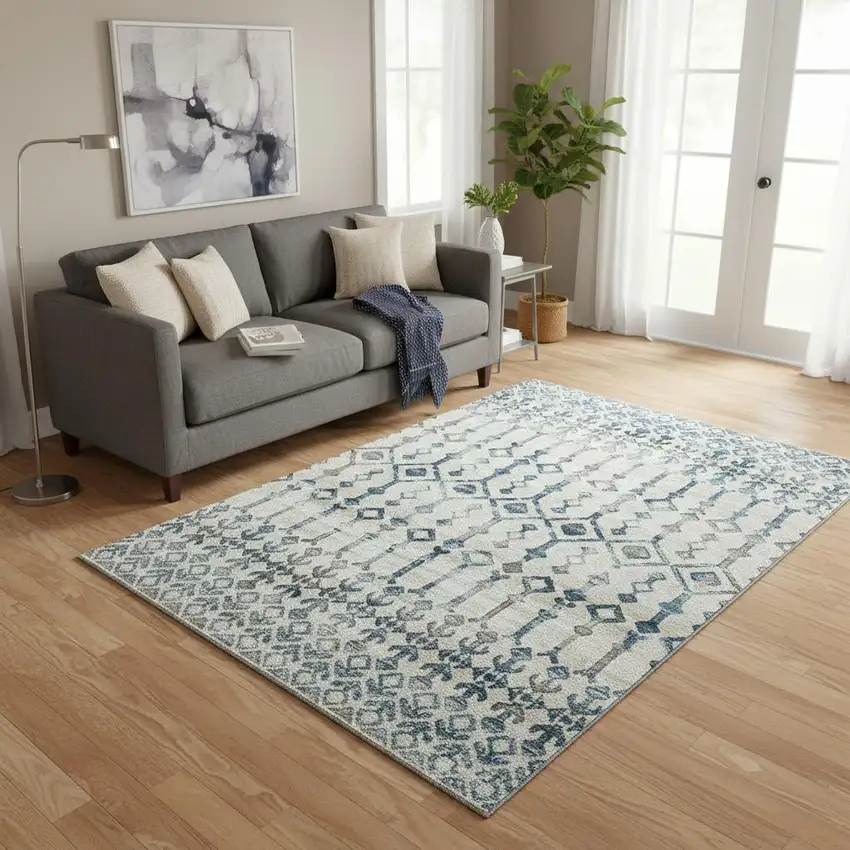 Ivory And Blue Tribal Washable Area Rug With UV Protection Photo 1