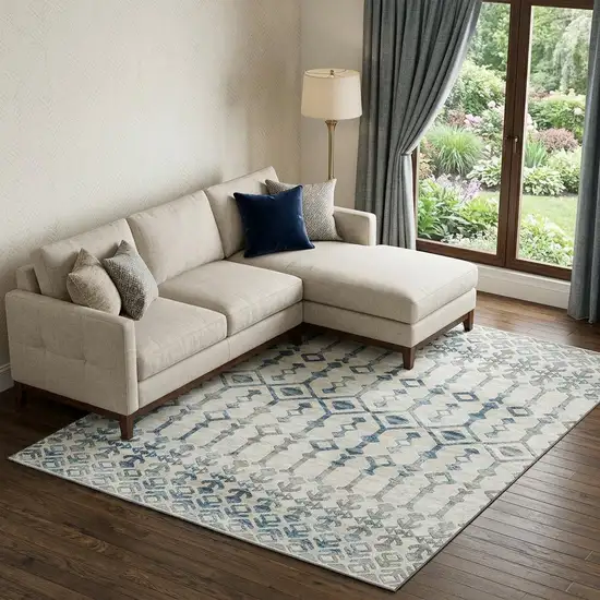 Ivory And Blue Tribal Washable Area Rug With UV Protection Photo 1