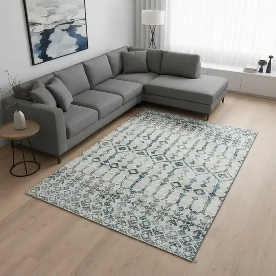 Ivory And Blue Tribal Washable Area Rug With UV Protection Photo 1