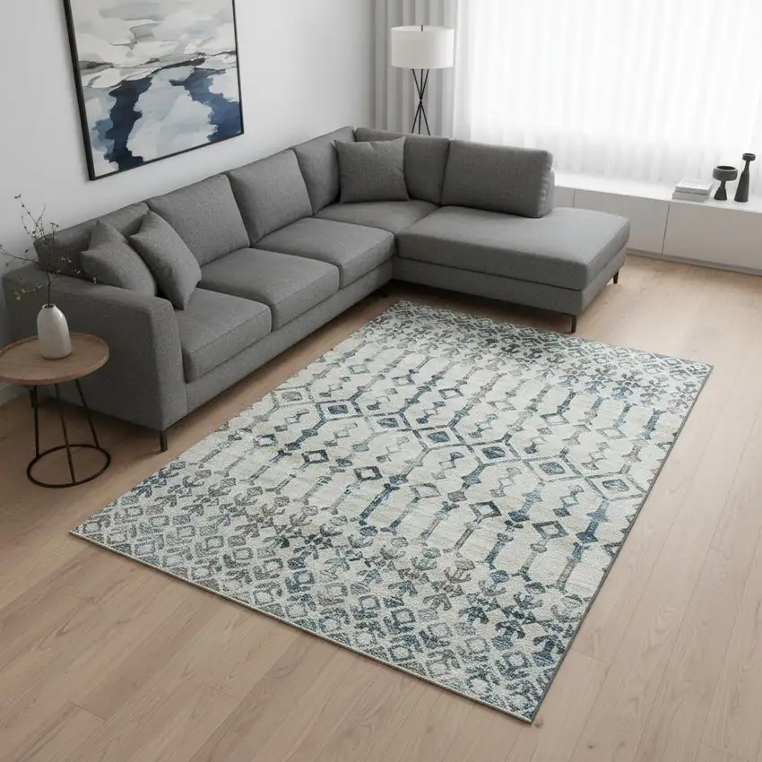 Ivory And Blue Tribal Washable Area Rug With UV Protection Photo 1