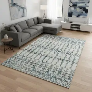 Photo of Ivory And Blue Tribal Washable Area Rug With UV Protection