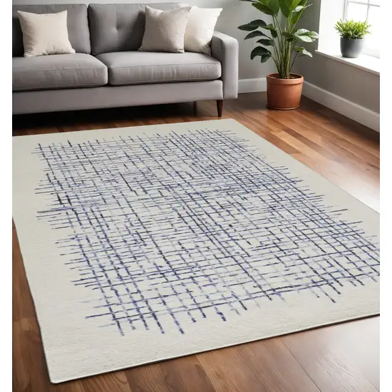 Ivory And Blue Wool Crosshatch Hand Tufted Area Rug Photo 1