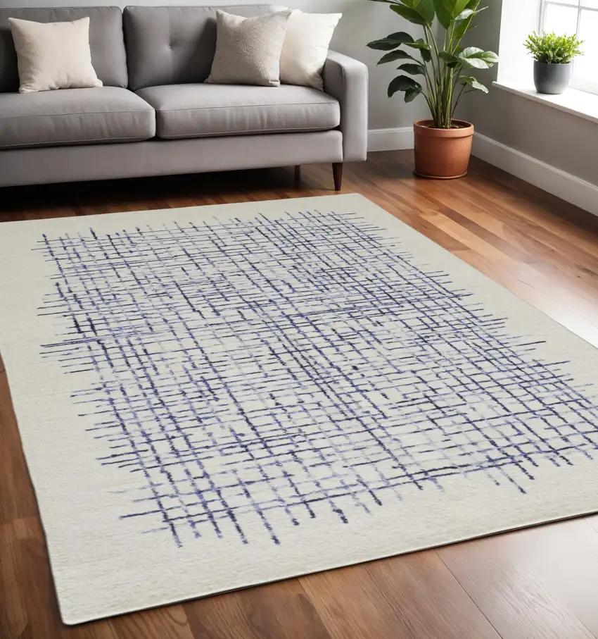 Ivory And Blue Wool Crosshatch Hand Tufted Area Rug Photo 1