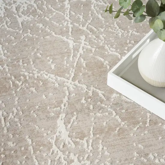 Ivory And Brown Abstract Area Rug Photo 9