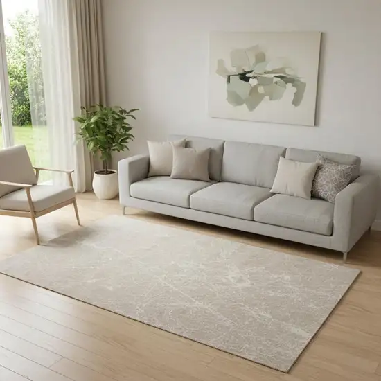 Ivory And Brown Abstract Area Rug Photo 1