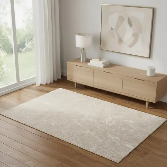 Ivory And Brown Abstract Area Rug Photo 1