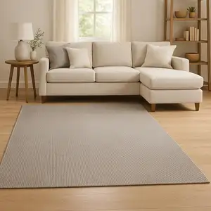 Photo of Ivory And Brown Abstract Area Rug