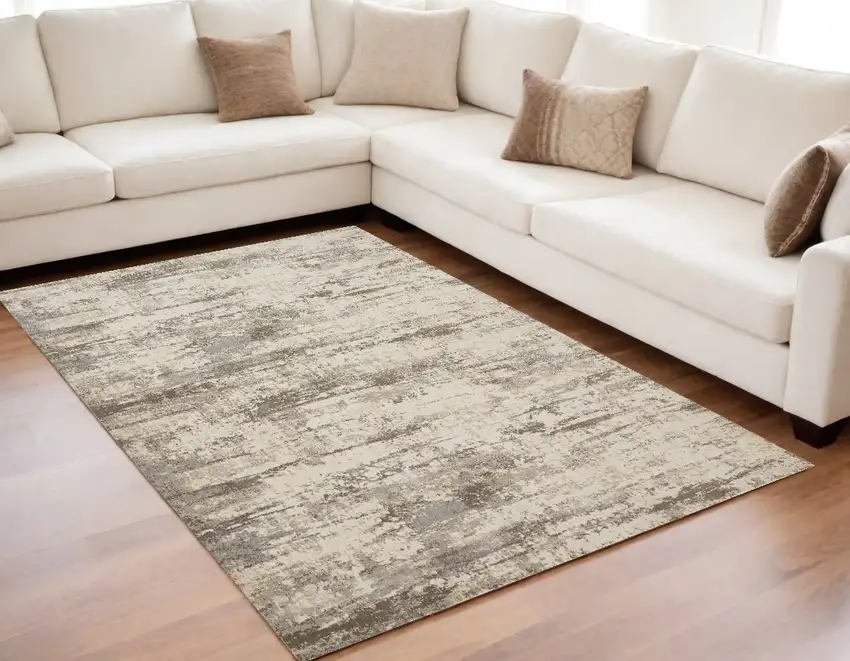 Ivory And Brown Abstract Area Rug Photo 1