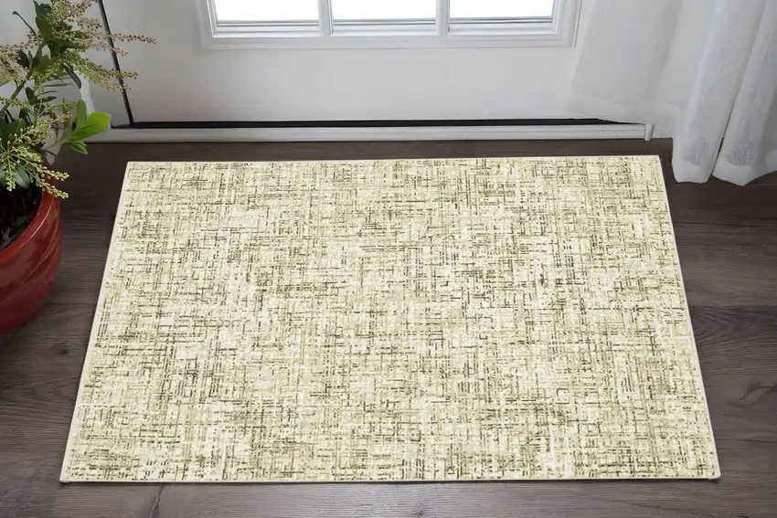 Ivory And Brown Abstract Area Rug Photo 1