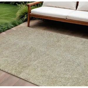 Photo of Ivory And Brown Abstract Washable Indoor Outdoor Area Rug