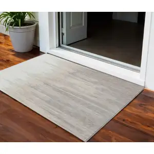Photo of Ivory And Brown Abstract Washable Indoor Outdoor Area Rug