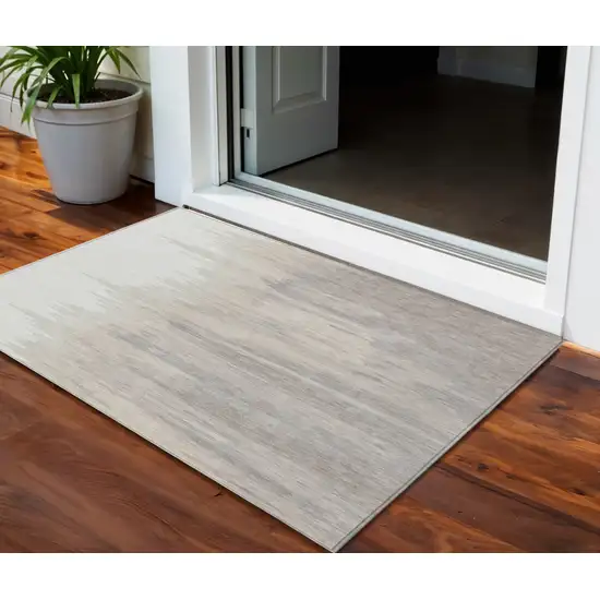 Ivory And Brown Abstract Washable Indoor Outdoor Area Rug Photo 1