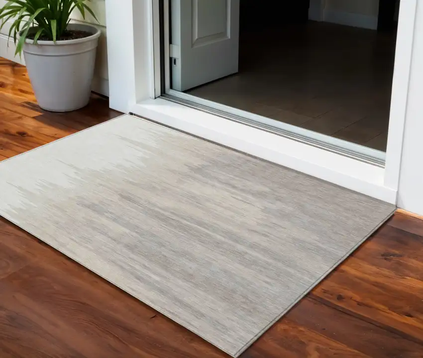 Ivory And Brown Abstract Washable Indoor Outdoor Area Rug Photo 1