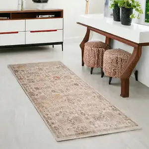 Photo of Ivory And Brown Floral Medallion Runner Rug With Fringe