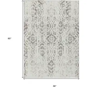 Photo of Ivory And Brown Floral Washable Indoor Outdoor Area Rug