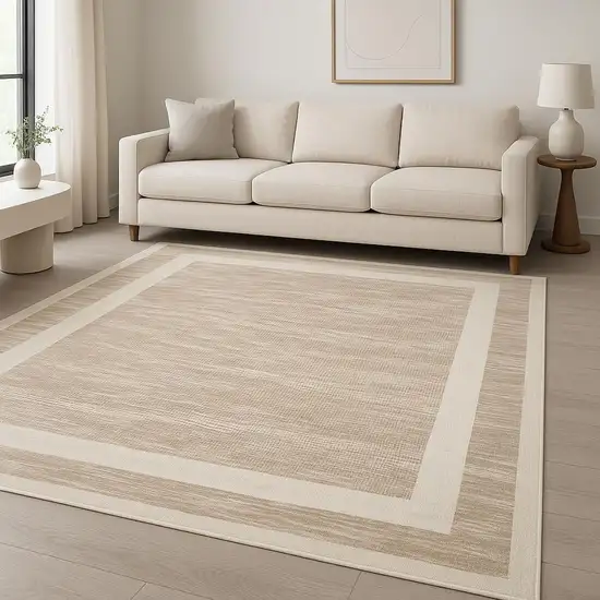 Ivory And Brown Geometric Area Rug Photo 1