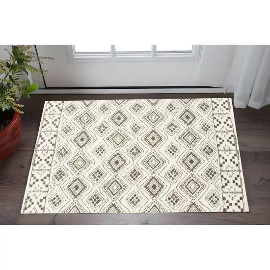 Ivory And Brown Geometric Shag Power Loom Stain Resistant Area Rug Photo 1
