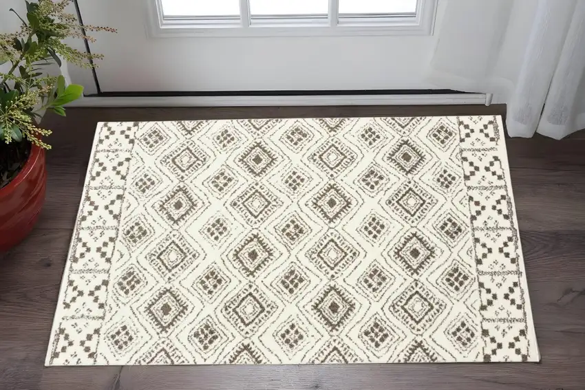 Ivory And Brown Geometric Shag Power Loom Stain Resistant Area Rug Photo 1