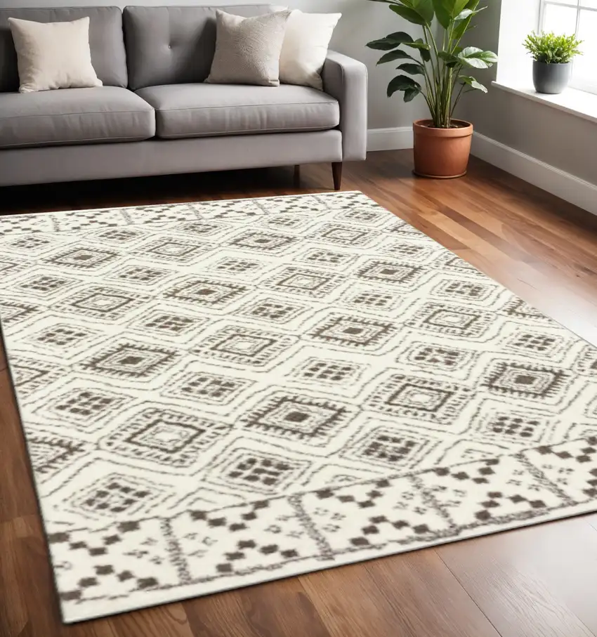 Ivory And Brown Geometric Shag Power Loom Stain Resistant Area Rug Photo 1