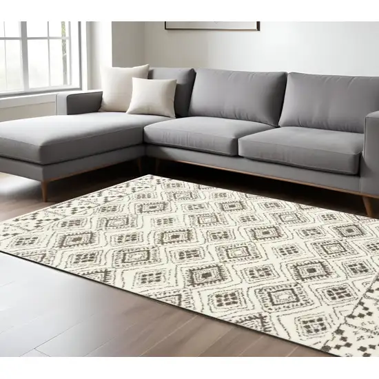 Ivory And Brown Geometric Shag Area Rug Photo 1