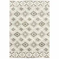 Photo of Ivory And Brown Geometric Shag Power Loom Stain Resistant Area Rug