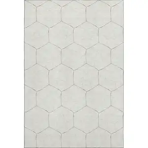 Photo of Ivory And Brown Geometric Washable Area Rug With UV Protection